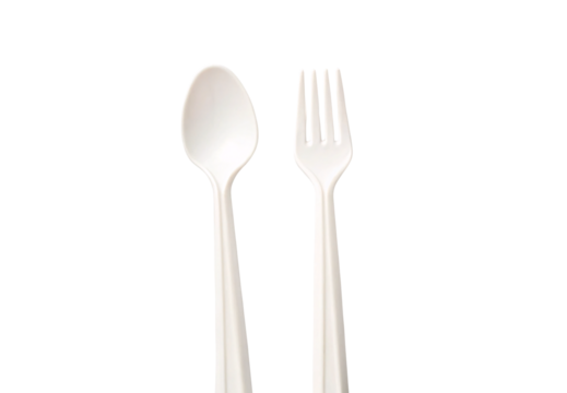 White plastic spoon and fork standing upright side by side with elegant design, isolated on a transparent background