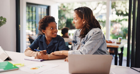 Mom, boy and talk with homework, book or happy with support for development, education or assessment. People, mother and child with notebook, listen and smile for elearning at interracial family home