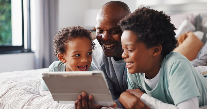 Tablet, relax and dad with children on bed in home for watching movie, series or show together. Laugh, bonding and African father with kids for streaming film on technology in bedroom at house. - Powered by Adobe