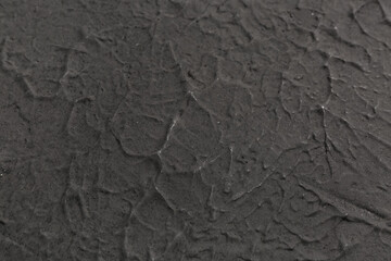 Closeup view of black grunge texture as background