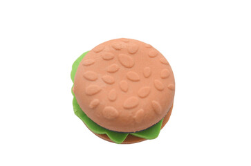 Iconic Fast Food: A classic hamburger with a textured sesame seed bun and a layer of fresh green lettuce, ready for a quick meal.
