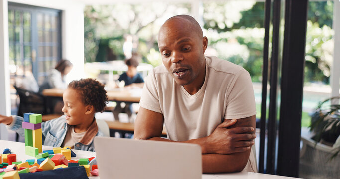 Video call, laptop and family with man in home for freelancer, virtual conference and multitasking. Online meeting, remote worker and child care with person in apartment for entrepreneur chat