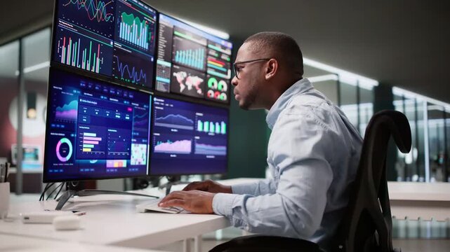 African Business Analyst Analyzing Data