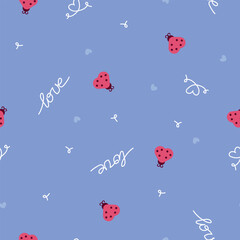 Blue seamless pattern with red ladybugs and handwritten love text creating a playful romantic background