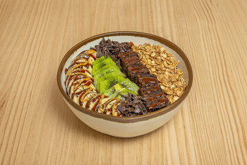 A touch of ground cinnamon sprinkled on the surface of the bowl adds aromatic warmth and a delicate, evocative visual pattern