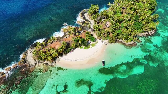 Aerial view of a tropical island featuring a pristine white beach, lush green vegetation, and turquoise waters, Bocas del Toro, Panama.