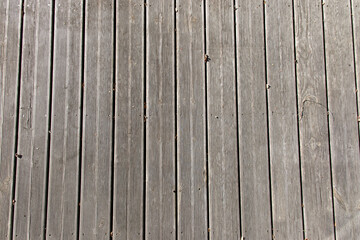 Plan rapproché d'une vue du dessus d'un plancher en bois grisé d'une terrasse