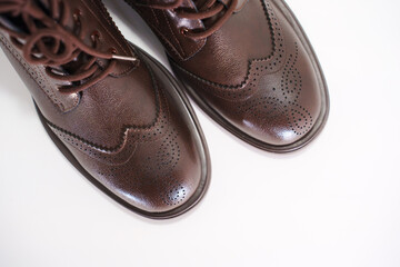 Stylish brown shoes with detailed stitching design