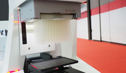 The machine is liquid handling system equipped with a pipetting head