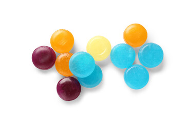 Different cough drops on white background