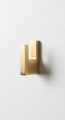 Modern Brass Hook on White Wall