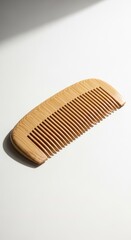 Wooden Comb on White Surface