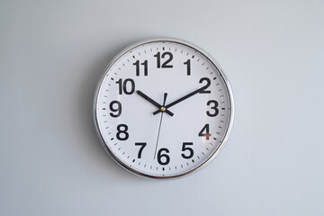 A round office clock.