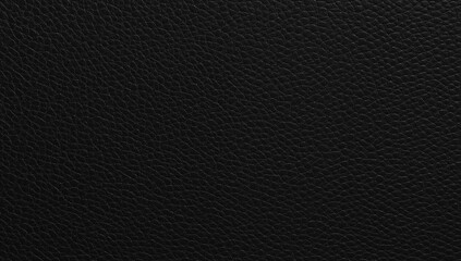 Closeup of seamless black leather texture, surface material for fashion applications, suitable for luxury wallet designs