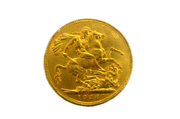 The reverse side of King George V gold sovereign coin, features the classic St. George and the Dragon, sovereigns are popular among UK investors, gold asset investment, market price of gold concept