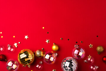 Festive Christmas ornaments on a red background.
