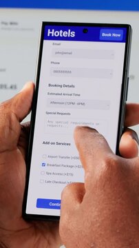 Man Using Smart Phone To Search Hotel