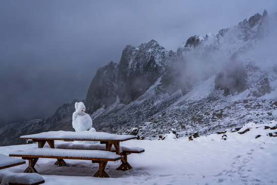 A snowman in the Swiss mountains.