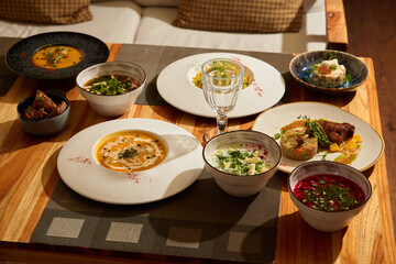 An Exquisite Culinary Spread Laid Out Beautifully on a Rustic Wooden Table for Everyone