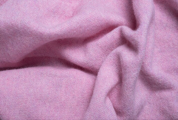 Fototapeta premium soft pink wool fabric with natural folds and cozy texture