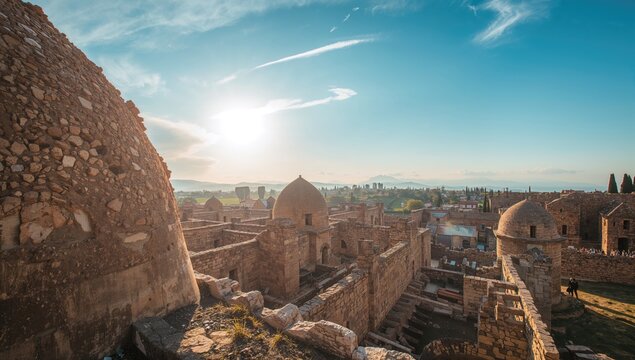 Historical granaries in a town, showcasing erosion risk,