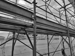Rome, Italy - October 8, 2025, detail of scaffolding, a temporary structure used in construction and maintenance to allow workers to work safely and access construction sites at height.
