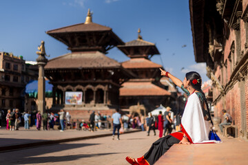 Nepali Newari Girl in Traditional Attire Gracefully Posing for Photoshoot at Patan Durbar Square