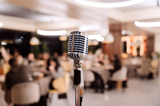 Retro microphone on stage in elegant restaurant ready for live performance