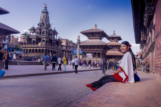 Nepali Newari Girl in Traditional Attire Gracefully Posing for Photoshoot at Patan Durbar Square