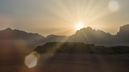 Sunrise over rocky mountains highlights the beauty of nature and the importance of conservation
