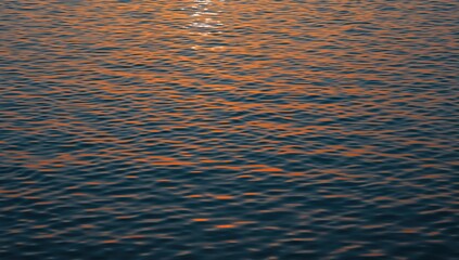 Fototapeta premium Morning glow shimmering on peaceful water with a blend of warm and cool tones, abstract natural texture with waves and summer vibes