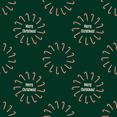 Merry Christmas lettering. Seamless pattern with candy canes and Christmas lettering. For gift wrapping, cards, backgrounds and covers.