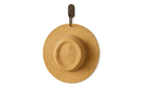 Straw fedora sun hat hanging on hook