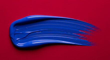 Blue Brushstroke on Red Background with Textured Paint