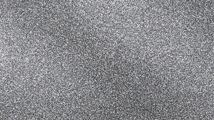 Fototapeta premium Close up macro view of a textured gray surface with tiny granular particles creating a speckled abstract pattern