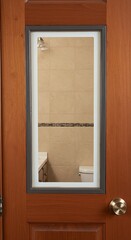 Wooden interior door with a narrow vertical window looking into a bathroom.