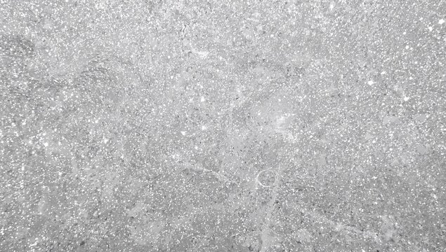 Shimmering silver sparkle texture with an abstract design