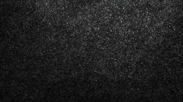 Abstract textured background with a dense pattern of tiny sparkling white particles on a dark black surface creating a sense of depth and shimmer
