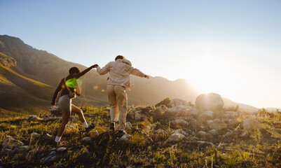 Couple hiking on a mountain path