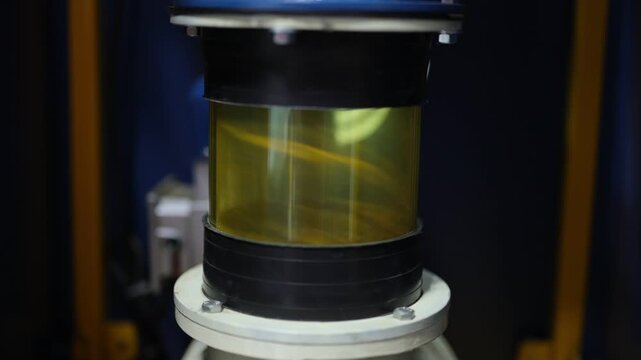 Turmeric powder grinding in a machine, slow motion scene for a corporate film in a factory, haldi powder 