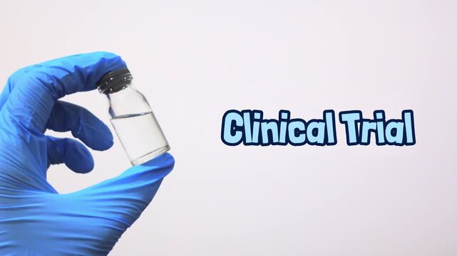 A hand wearing a blue glove holding a medicine bottle with the word "Clinical Trial" written next to it. Pharmaceutical industry, medical industry, health sciences, biotechnology