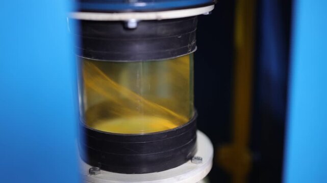 Turmeric powder grinding in a machine, slow motion scene for a corporate film in a factory, haldi powder 