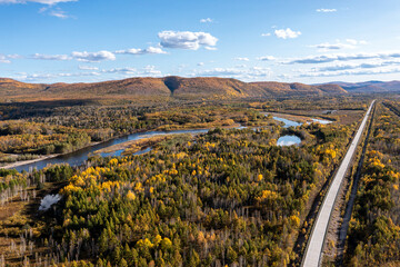 Aerial photography of autumn mountain forest road in Daxing'an Mountains
