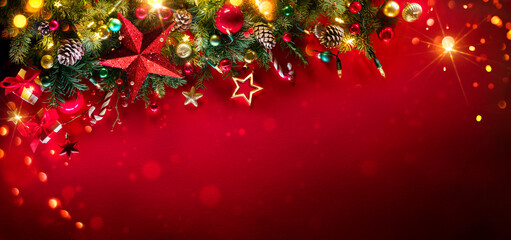 Christmas Red - Fir Branches With Baubles And String Lights In Festive Background - Ornaments And Decorations