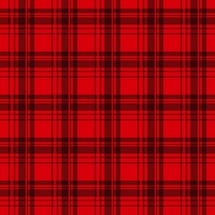 Seamless background of classic tartan plaid pattern in red and black tones