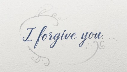 I forgive You! Handwritten message on paper, focus on emotional expression