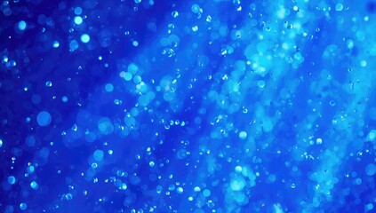 Blue particles floating in the air on a blue background for a festive atmosphere, suitable for a bright presentation