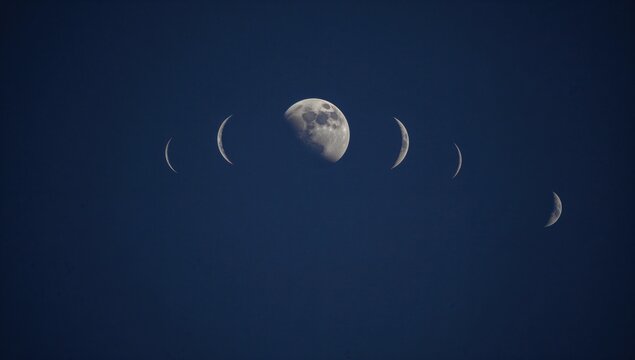 Stock photo of a moon phase, waning crescent visible in a clear night sky, celestial observation