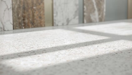 Samples of granite, marble and quartz for kitchen countertops, material selection for home renovation