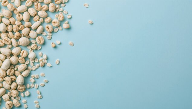Fox Nuts Spread on a Soft Blue Surface with Space for Text, Also Called Lotus Seed Pop or Gorgon Nut